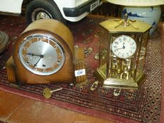 A Kundo anniversary clock with key and a Bentima Westminster mantle clock with key and pendulum.