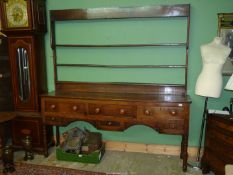 A peg-joyned Oak Welsh Dresser having three frieze drawers with three spice/trinket drawers below,