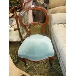 A Walnut/Mahogany framed late Victorian Side Chair standing on cabriole front legs,