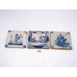 A pretty 18th century Dutch Delft tile painted in blue and manganese with a young girl holding a