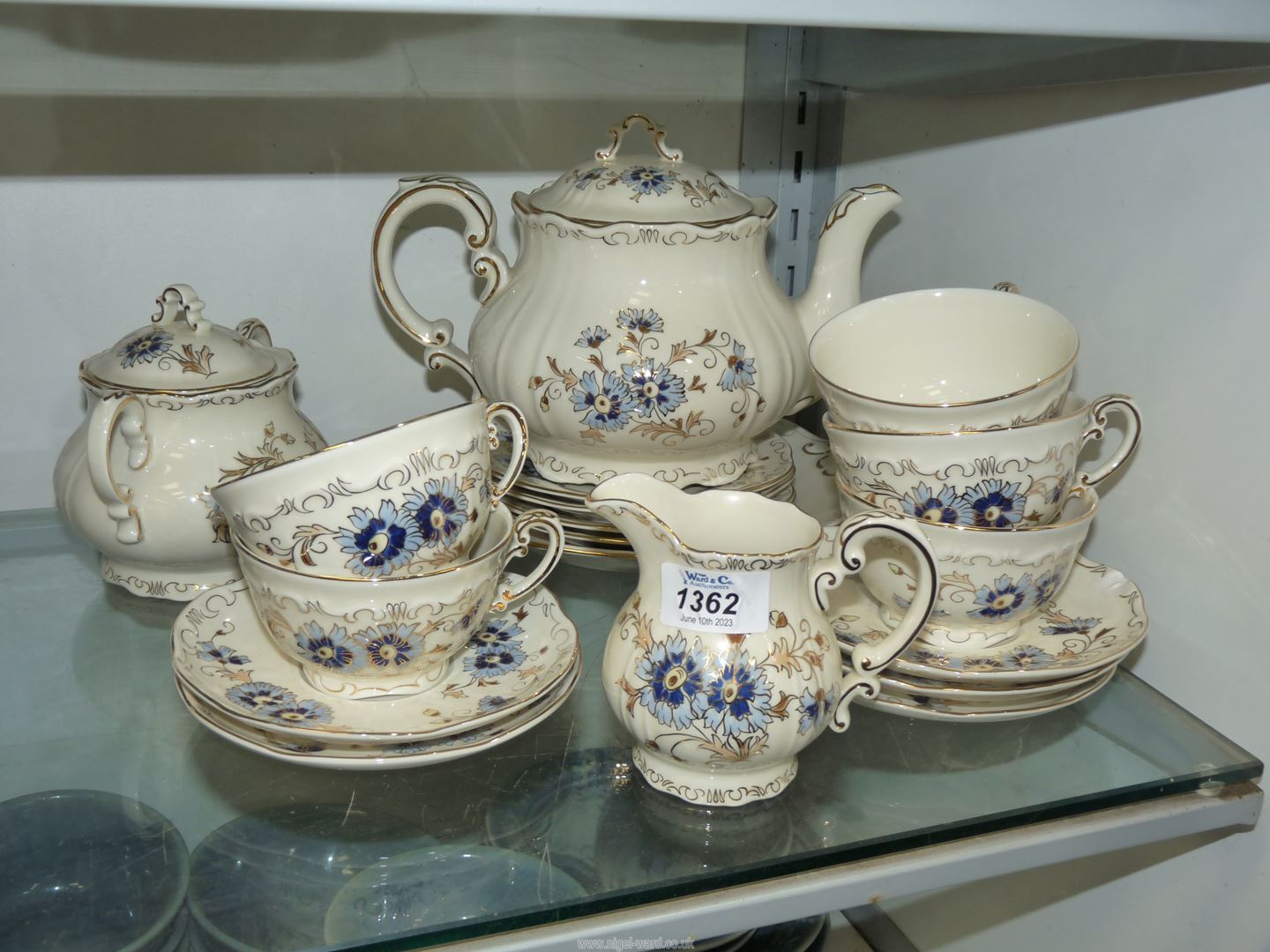 A Zsolnay Pecs, Cornflowers porcelain tea set to include teapot, milk jug, sucrier,