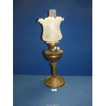 A Victorian Oil lamp with metal base and reservoir with frosted glass shade, 24" tall, a/f.
