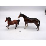 A Beswick Bay Horse and Beswick Trotting Pony in matt finish.