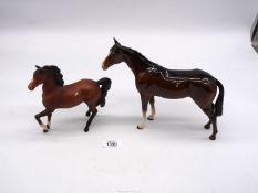 A Beswick Bay Horse and Beswick Trotting Pony in matt finish.