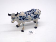 A blue and white figure of Cow, 17 cm long.