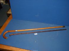 A bamboo cased sword stick, plus another sword stick having a silver collar, blade (a/f).