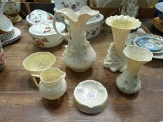 A small quantity of Belleek china including small jug and bowl, ashtray,