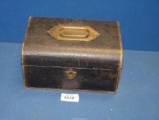 A Victorian jewellery box in black leather having a russet red lining (a/f), (no key present).