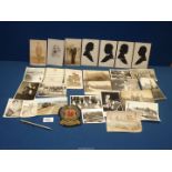 A quantity of miscellanea to include; old photographs and postcards from WWI era,