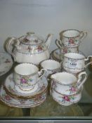 A Royal Albert Teaset in "Petit point china" pattern comprising of a six cups, saucers,