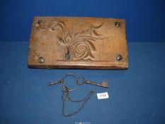 An antique carved oak Door Lock together with three old keys.