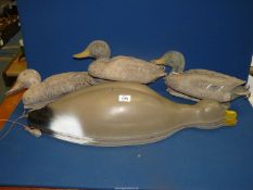 A box of vintage plastic duck and goose decoys.