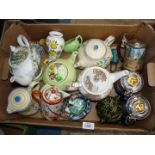 A quantity of teapots including Country Cottage, Cottage by a stream, 1970 teapot,