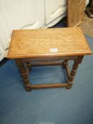 An Oak Joynt Stool standing on turned legs with perimeter stretchers, the top having a moulded edge,