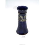 A dark blue Doulton ceramic vase no. 8212, 8" tall.