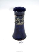 A dark blue Doulton ceramic vase no. 8212, 8" tall.
