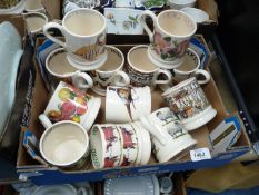 Twelve Emma Bridgewater mugs including; sheep, dogs, cows, rose, etc. (some with crazing).