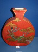 A colourful Oriental Vase, the red ground leather effect exterior with design of geisha girl,