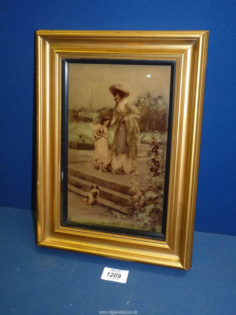 A framed crystoleum of a lady and a girl in a garden with two dogs, 13'' x 9 1/2''. - Image 2 of 2