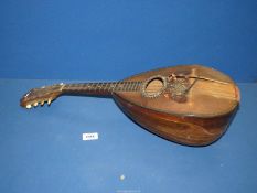 A Mandolin by Jerome Thibouville, Lamy & Co., bowl backed, some damage.