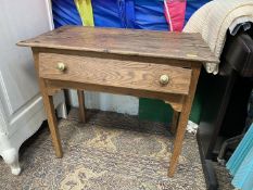 A mid oak Side Table standing on tapering square legs and having frieze drawer with brass knob