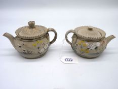 A pair of Japanese Banko style Teapots in grey ground with Crane detail,