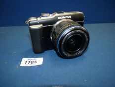 An Olympus PEN E-PL1 Mirrorless camera with Olympus M.