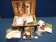 A Sewing box and contents plus a neck ruff.