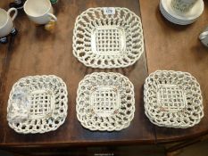 A 1960's Spanish lattice ware plate and six small plates (one a/f.).