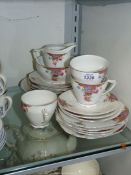 A Czechoslovakian 'Victoria' china part tea set including; cups, saucers, side plates,