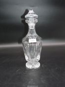 A Waterford Crystal mallet decanter having pagoda shaped stopper. 13" tall.