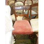 A circa 1900 Mahogany framed Side Chair having a leaf scroll detail cross splat,