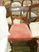 A circa 1900 Mahogany framed Side Chair having a leaf scroll detail cross splat,
