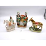 Three Staffordshire figures including hunting figures (a/f),