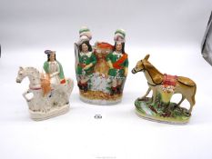 Three Staffordshire figures including hunting figures (a/f),