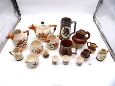 A quantity of hunting teasets also a gold lacquered tankard and a large tankard etc.