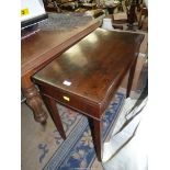 A 19th c rear swing-leg Mahogany flap over Tea Table standing on tapering square legs,