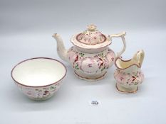 An early Victorian lustre part Teaset comprising teapot, slop bowl and jug,