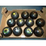 Two sets and three odd black Lawn Bowls including Hemselite Supergrip, Size 6, heavyweight model,