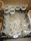 A quantity of cut glasses including set of six wine glasses, whisky tumblers,