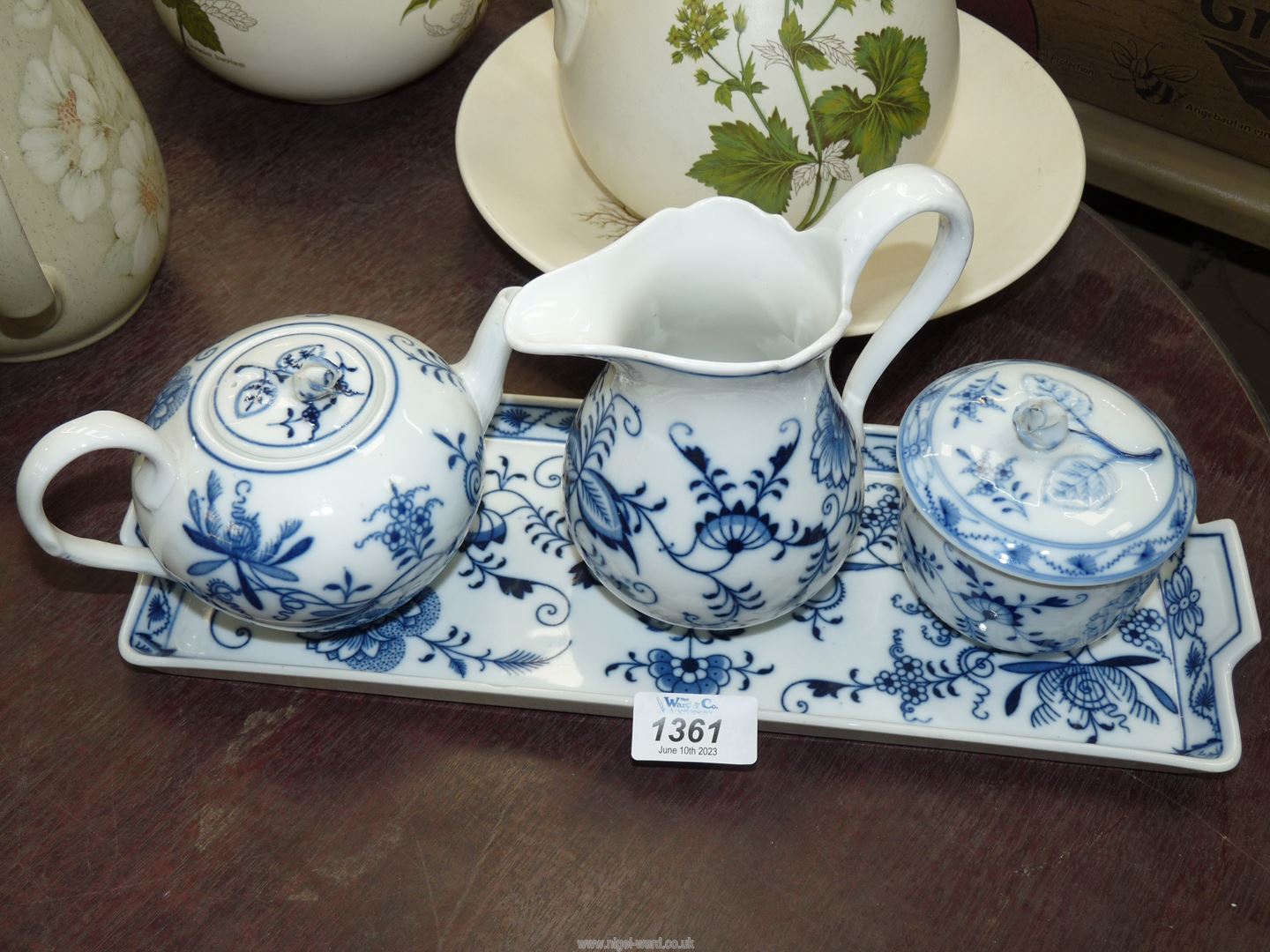 A Meissen blue and white part Teaset to include tray, pot, jug and lidded jar.