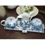 A Meissen blue and white part Teaset to include tray, pot, jug and lidded jar.