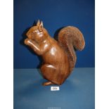 A large carved figure of a Squirrel, 11 1/2'' x 8 1/2''.
