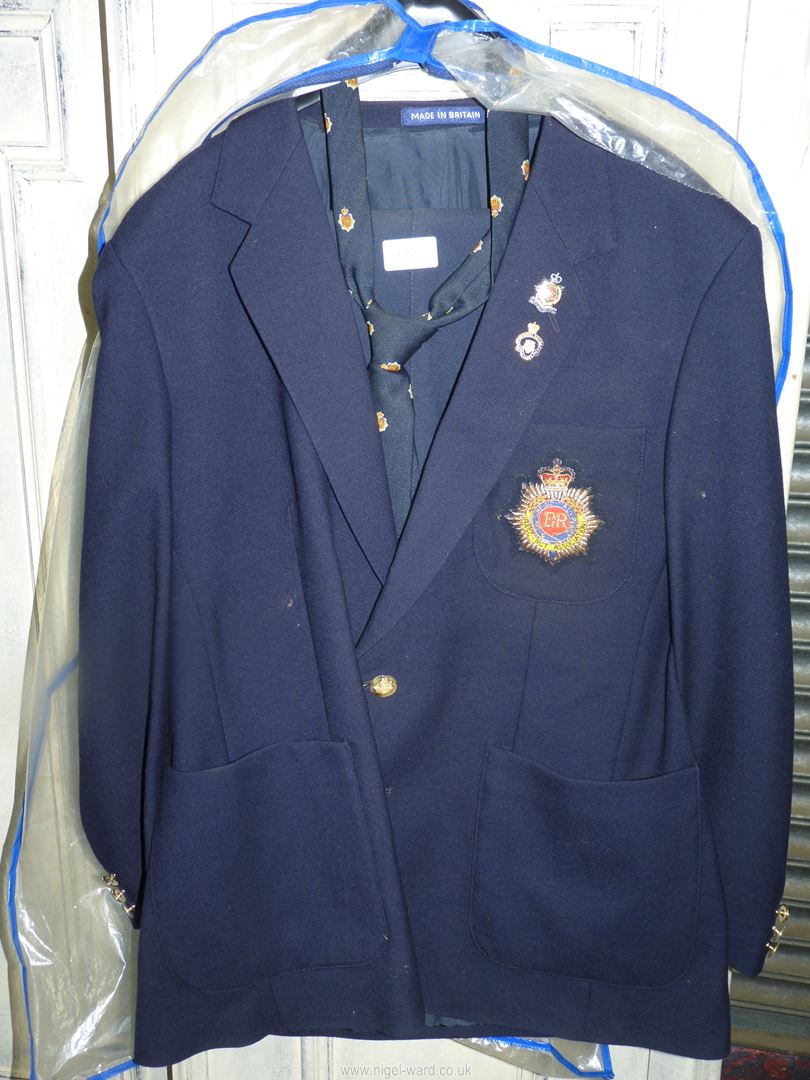 A Royal British Legion navy woollen suit with tie and badges made by Dunn & Co, no size on jacket,