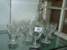 Eight Royal Doulton wine glasses and matching decanter
