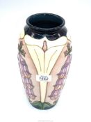A Moorcroft Foxglove vase, design by Rachel Bishop, signed to base, 10" tall.