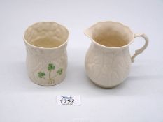 An Irish Belleek creamer and Shamrock vase.