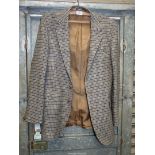 A Moss Bros single breasted gentleman's jacket in Harris tweed, double vented, size L (42" chest).