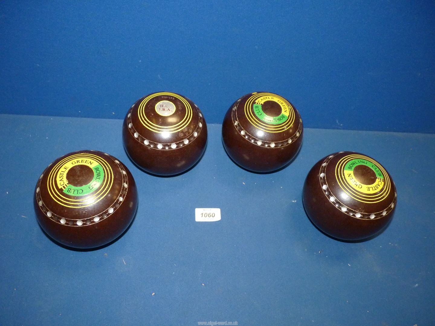 A set of Lawn Bowls, brown with silvered effect dimple detail by Hemselite, 'Championship',