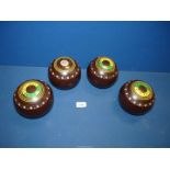 A set of Lawn Bowls, brown with silvered effect dimple detail by Hemselite, 'Championship',